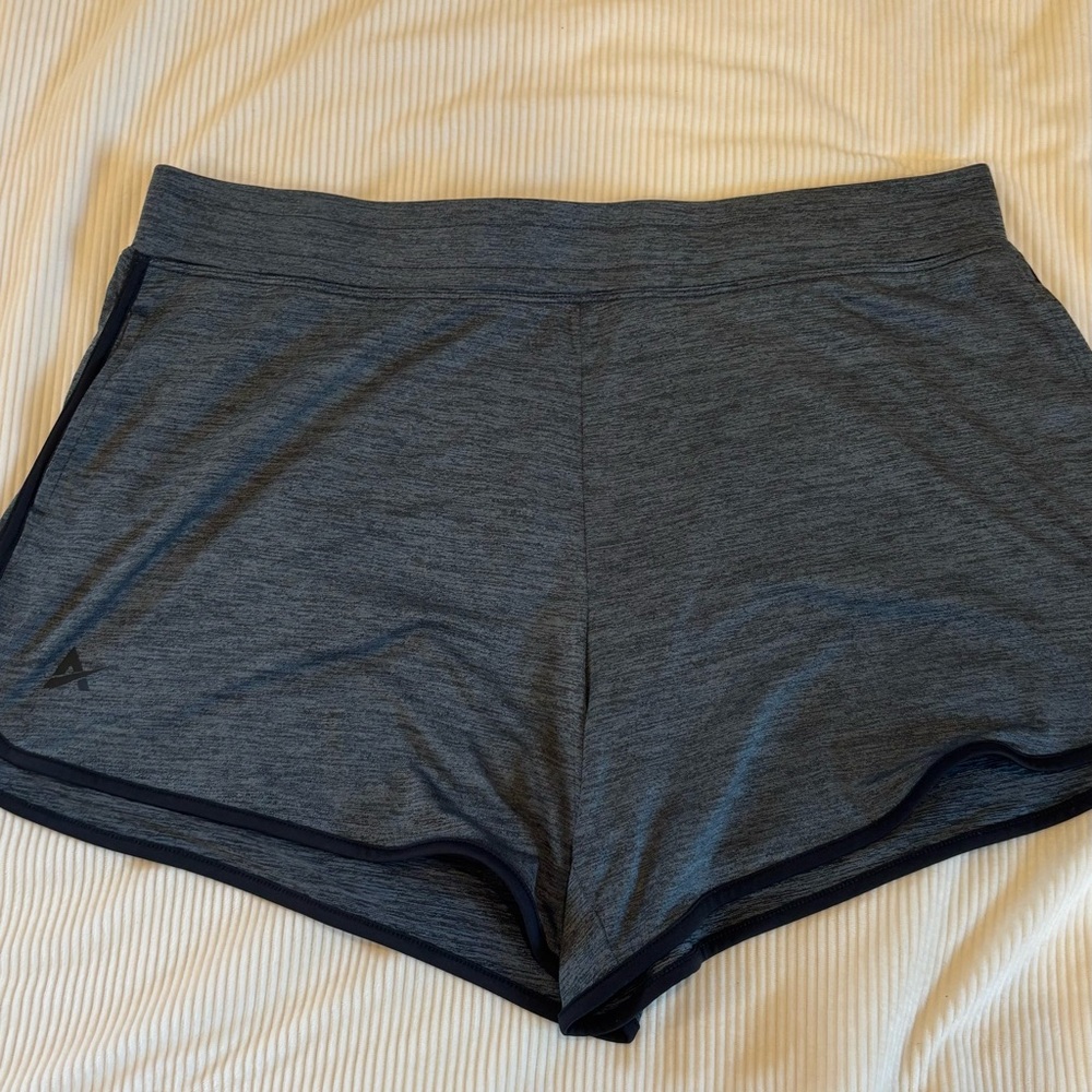 Gray Athletic Shorts with Elastic Waistband and Curved Hem